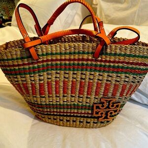 Colorful straw beach bag from Tory Burch. New season
